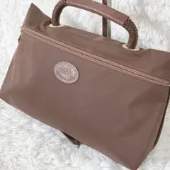 LONGCHAMP ハンドバッグ　ナイロンポーチ　ファスナープル　ゴールド　ロゴ