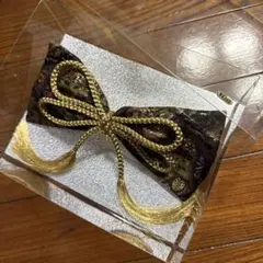 成人式　リボン型髪飾り 黒と金 房飾り付き20センチ