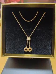 グロッセ、モーションミスクリアネックレス、ゴールドタイプ。