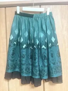 axes femme POETIQUE アリス柄スカート