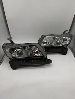 エアウェイブ ヘッドライト ハロゲン レベ付 KOITO 100-22591 - メルカリ
