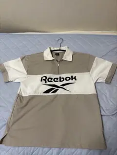 Reebok ハーフジップ ポロシャツ ベージュ Mサイズのサムネイル