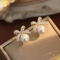 パール風　りぼん　ピアス　結婚式　お呼ばれ　フォーマルアクセサリー　イヤリング