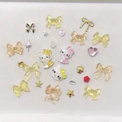 ネイルパーツ　まとめ売り　サンリオ　キティ　イエロー　黄　ゴールド　シルバー
