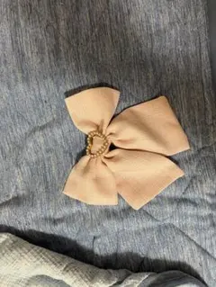 リボン型ピンクブローチ