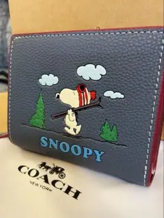 【新作新品未使用】COACH コーチスヌーピーコラボ二つ折り財布