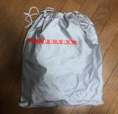 PRADA プラダ 巾着袋 ポーチ 袋 ２枚セット ロゴ 白 B4712 PRADA プラダ 巾着袋 ポーチ 袋 2枚セット ロゴ 白 B4712 - メルカリ