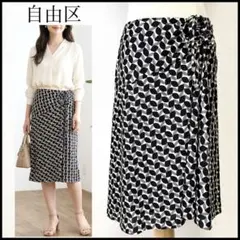 【未使用に近い】自由区 膝丈 フレアスカート 総柄 リボン アシンメトリー L