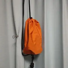 ユニクロ ミニドローストリングバッグ オレンジ