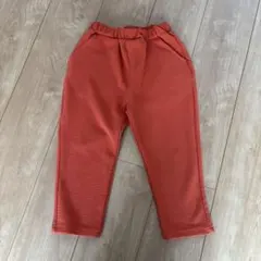 オレンジ色のウエストゴムパンツ