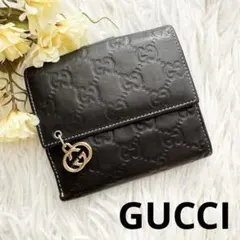 希少 GUCCI 二つ折り 財布 シマ インターロッキング GG チャーム 濃茶のサムネイル