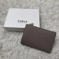 未使用級 フルラ 折財布 ラウンドジップ グレー系 箱カードなど - メルカリ
