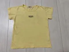 BeBe イラスト付き黄色Tシャツ