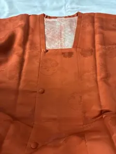 オレンジ色の模様入り道行コート