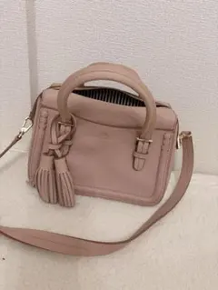 Katespadeピンクレザーショルダーバッグ タッセル付き