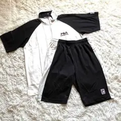 【美品】フィラ L セットアップ上下 メンズ 半袖ハーフジップ黒白ジャージのサムネイル