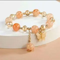 バタフライチャームブレスレット　優しい薄めのベージュ