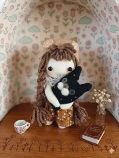 思わず抱きしめたくなる黒猫ちゃんと一緒のサムネイル