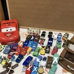 カーズトミカ　マックのトレラー　基地に変身メーター　まとめ売り Amazon.co.jp: ディズニー カーズ トミカ 基地に変身!メーター