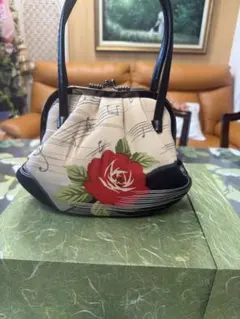 優良織工芸館 ハンドバッグ 青色と多色 - メルカリ