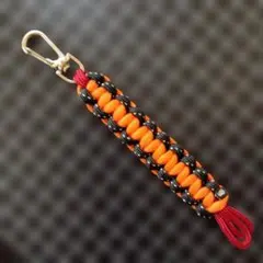 パラコード編み込みストラップ オレンジ黒