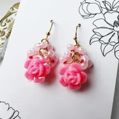オレンジ色の薔薇のピアス☆しずく♪ロザフィ - メルカリ