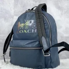 美品 コーチ レザー バックパック ホースアンドキャリッジ ネイビー