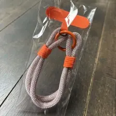 新品スマホストラップ 携帯ストラップ キラキラ 手首 落下防止　オレンジ
