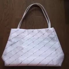 marie claire 透け感のあるピンクのバッグ