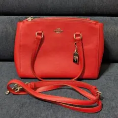 COACH ハンドバッグ レッド タッセル付き - メルカリ
