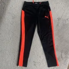 サイズ140センチ/男の子/PUMA ピステパンツ 黒/オレンジ サイドジッパー