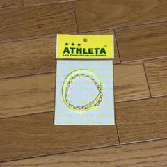ATHLETA アスレタ ミサンガ風 ヘアゴムのサムネイル