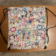 ニュージーンズ　村上隆コラボナップサック