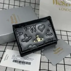 新作✨️】柄付き Vivienne Westwood 3つ折り財布 エナメル - メルカリ