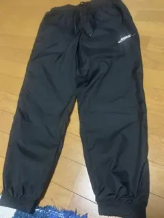 NIKE ナイロンパンツ レディースS ブラック スウッシュロゴ ジョガーパンツ