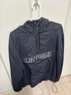 UNDEFEATED Champion ハーフジップ ナイロンジャケット Lのサムネイル