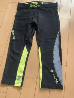 【USED】 SKINS トレーニングパンツ 黒/黄色