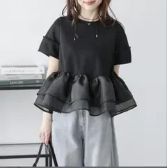 ラジエム　シアーフリルドッキングペプラムトップスのサムネイル