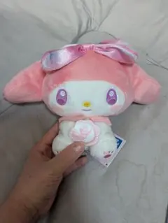 リボン付きピンクぬいぐるみ