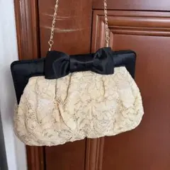 リボン付きレースクラッチバッグ