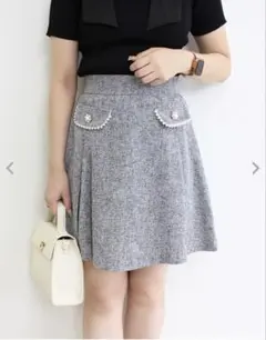 イング　装飾ボタンツイードタックフレア／スカート