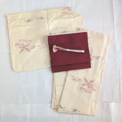 紬着物　袷【アイボリー炭黒赤絣花柄流紋】/紬名古屋帯/帯締め/帯揚げのサムネイル