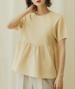 ボリュームスリーブペプラムセーター