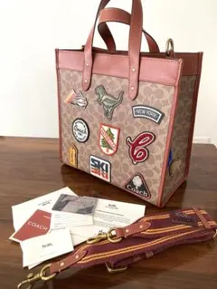 【値下げ！！】COACH パッチ付きトートバッグ　恐竜