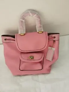 新品COACHピンクリュックプラ袋布袋付き