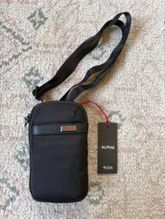 新品:TUMI ALPHA スモール クロスボディ ポーチ黒 携帯 サコッシュ