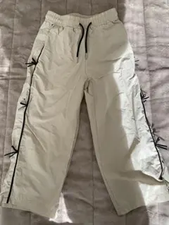 ベージュの7Yパンツ サイドリボン付き