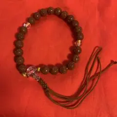 天然木風数珠 ブレス念珠 手彫り風 ナチュラル房付 【紫の数珠入れ付き】