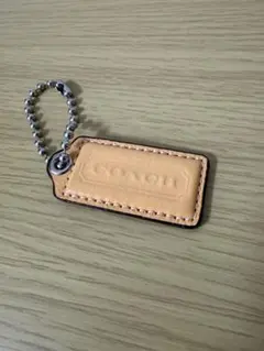 COACH バッグチャーム キーホルダー ベージュ　レザー　エナメルのサムネイル