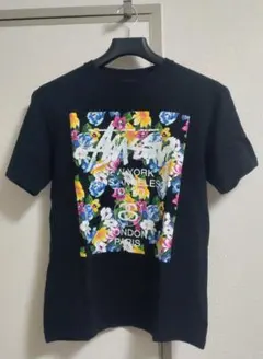 Stussy フラワープリント ワールドツアー Tシャツ ブラック